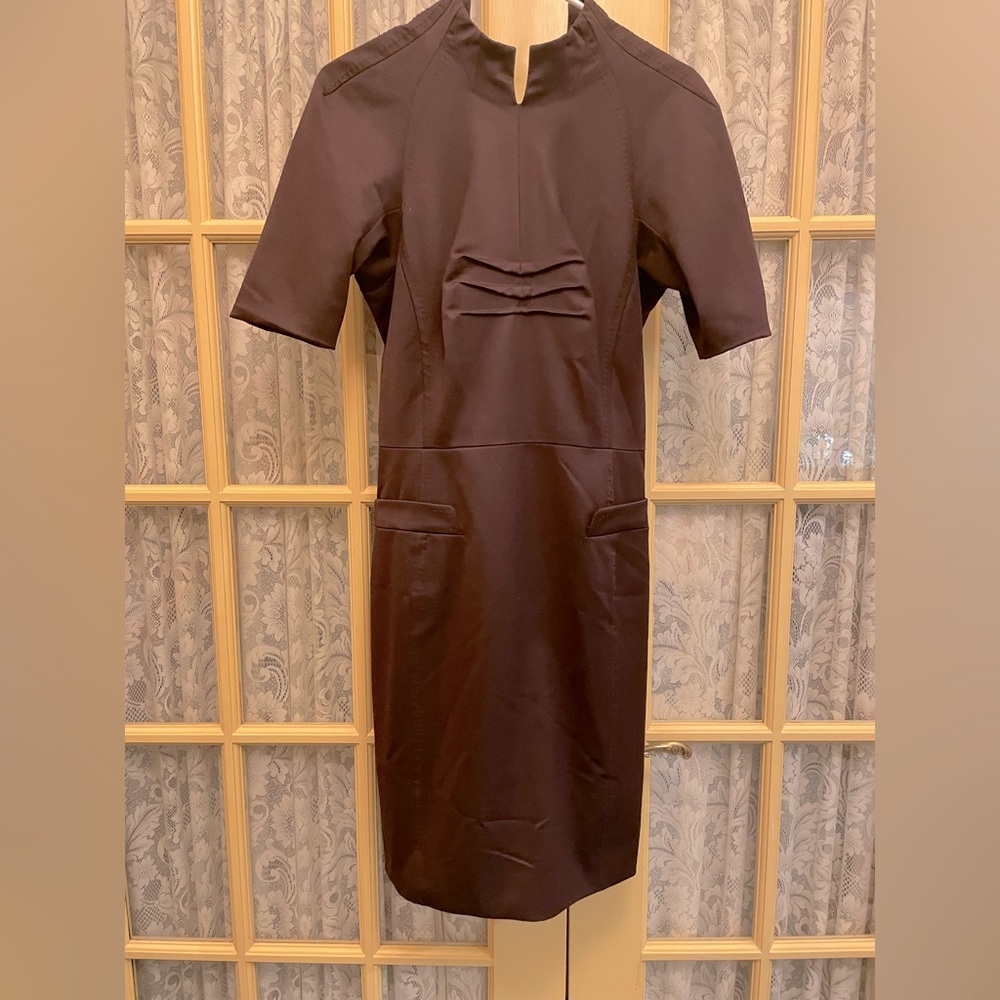 Beautiful chocolate brown dress with unique design. Mandarin collar.
